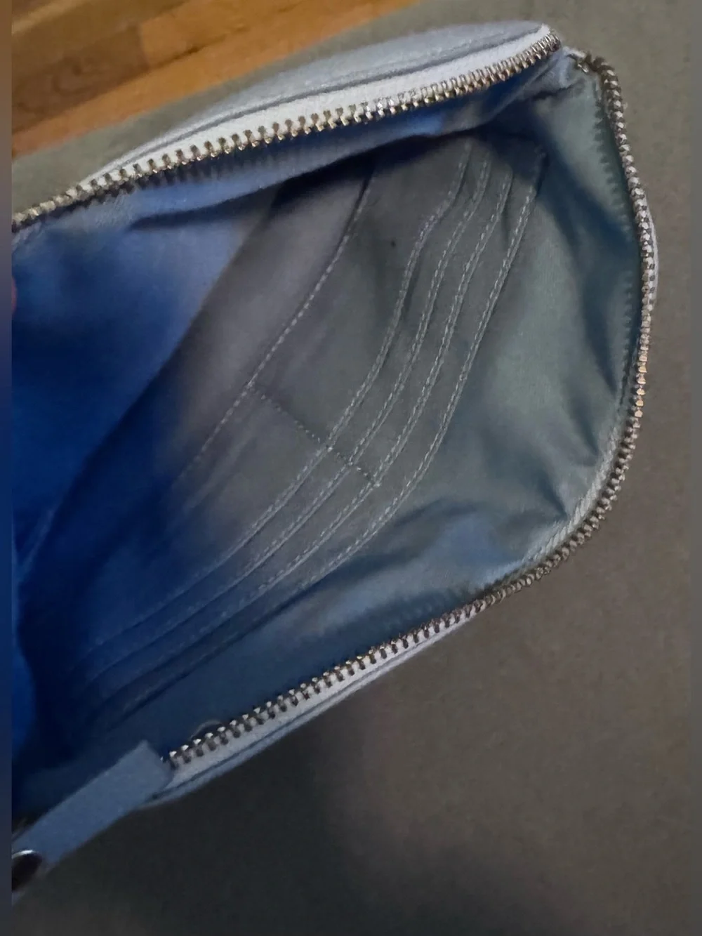 Lodis Small Pebble Leather Wristlet Clutch in Periwinkle with Gold Logo